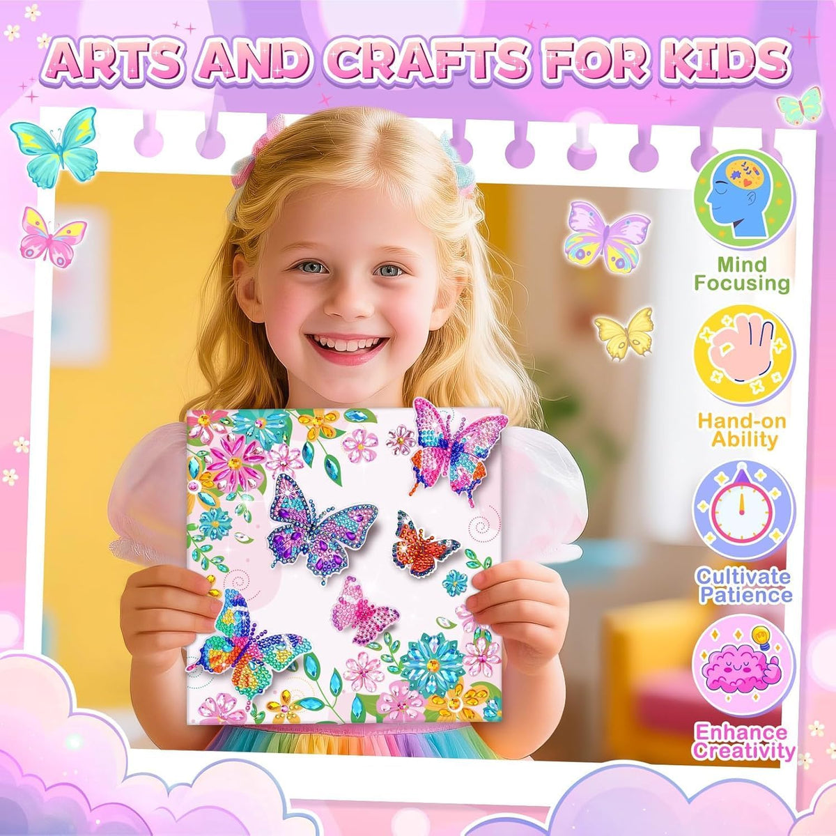 A girl holding up the finished butterfly canvas and smiling