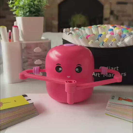 DoodleMate drawing robot drawing a flower, then a child colouring it in